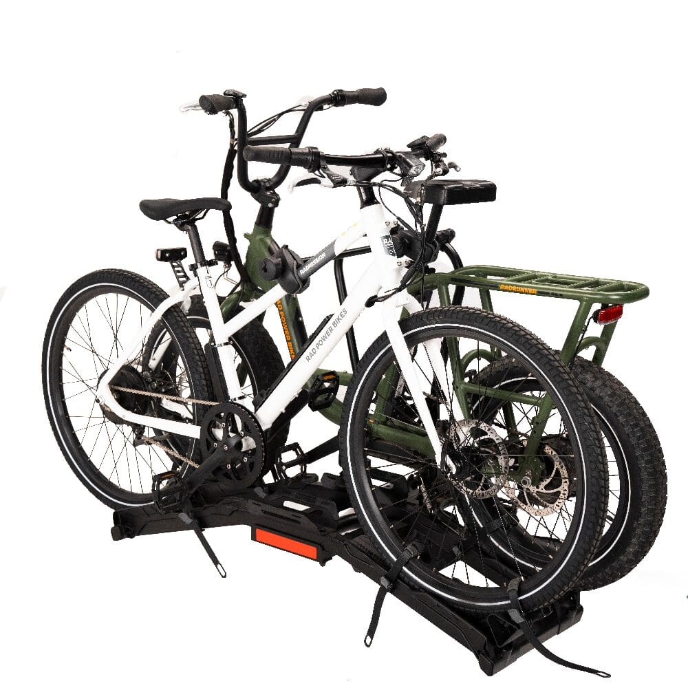 Two bicycles mounted on rear hitch bike rack