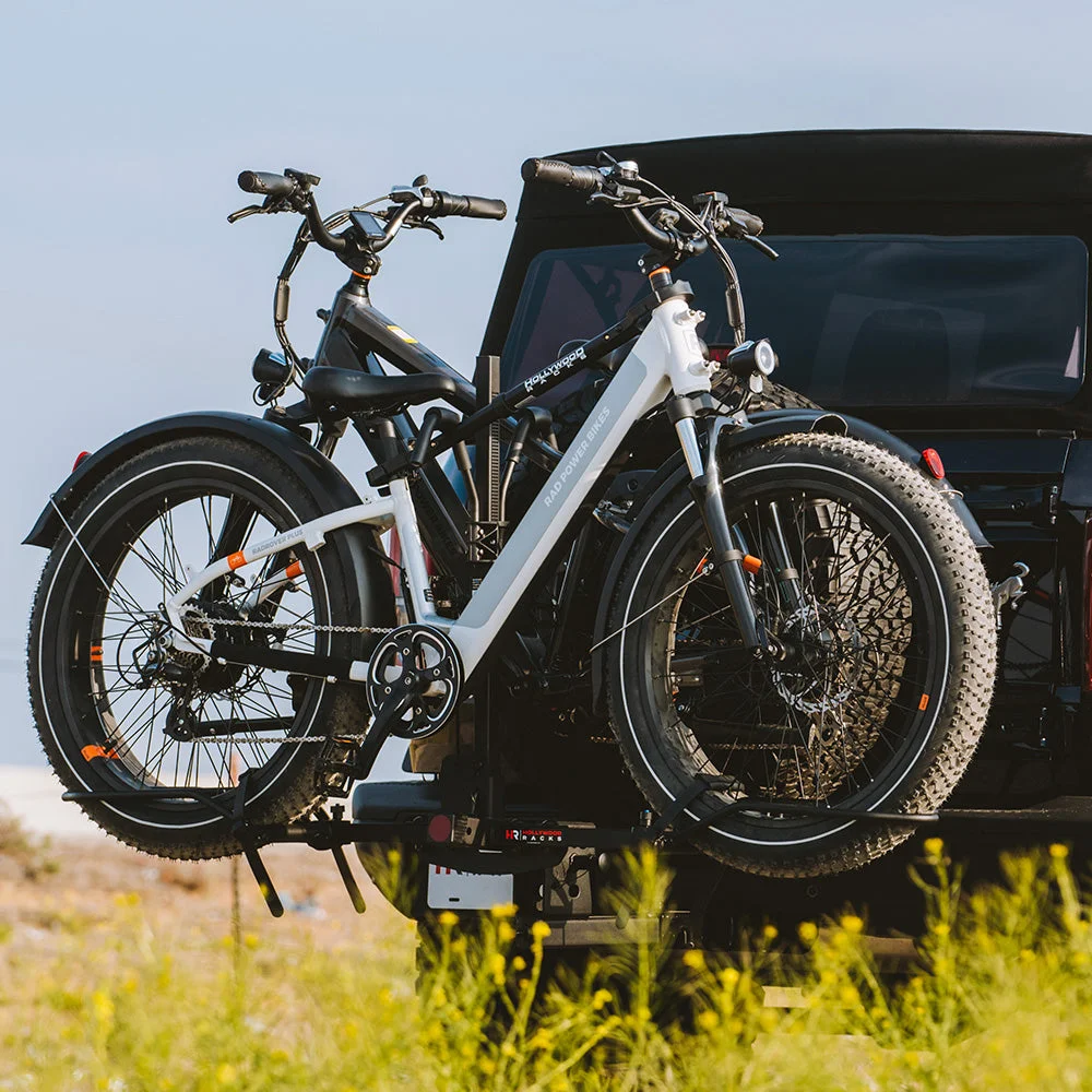 Two e-bikes mounted on vehicle