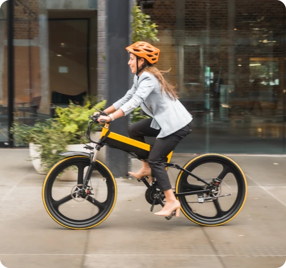 Woman cycling in urban setting