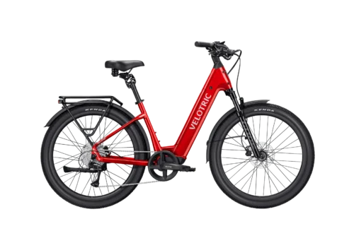 Red step-through electric bicycle on black background