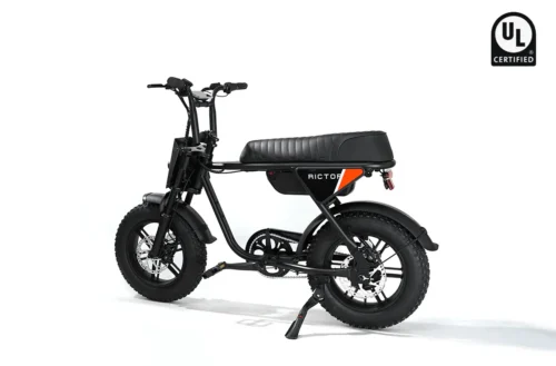 Black electric moped-style bike with fat tires