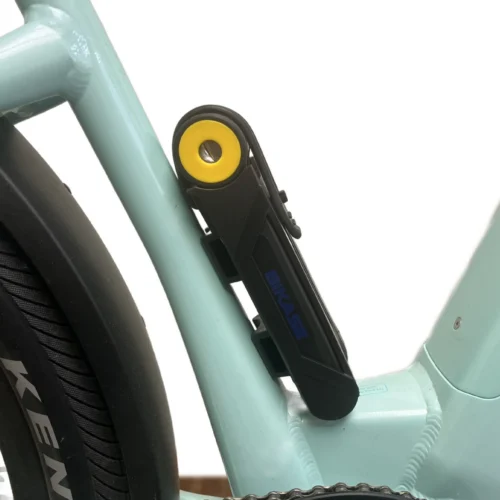 Black folding bike lock mounted on mint frame